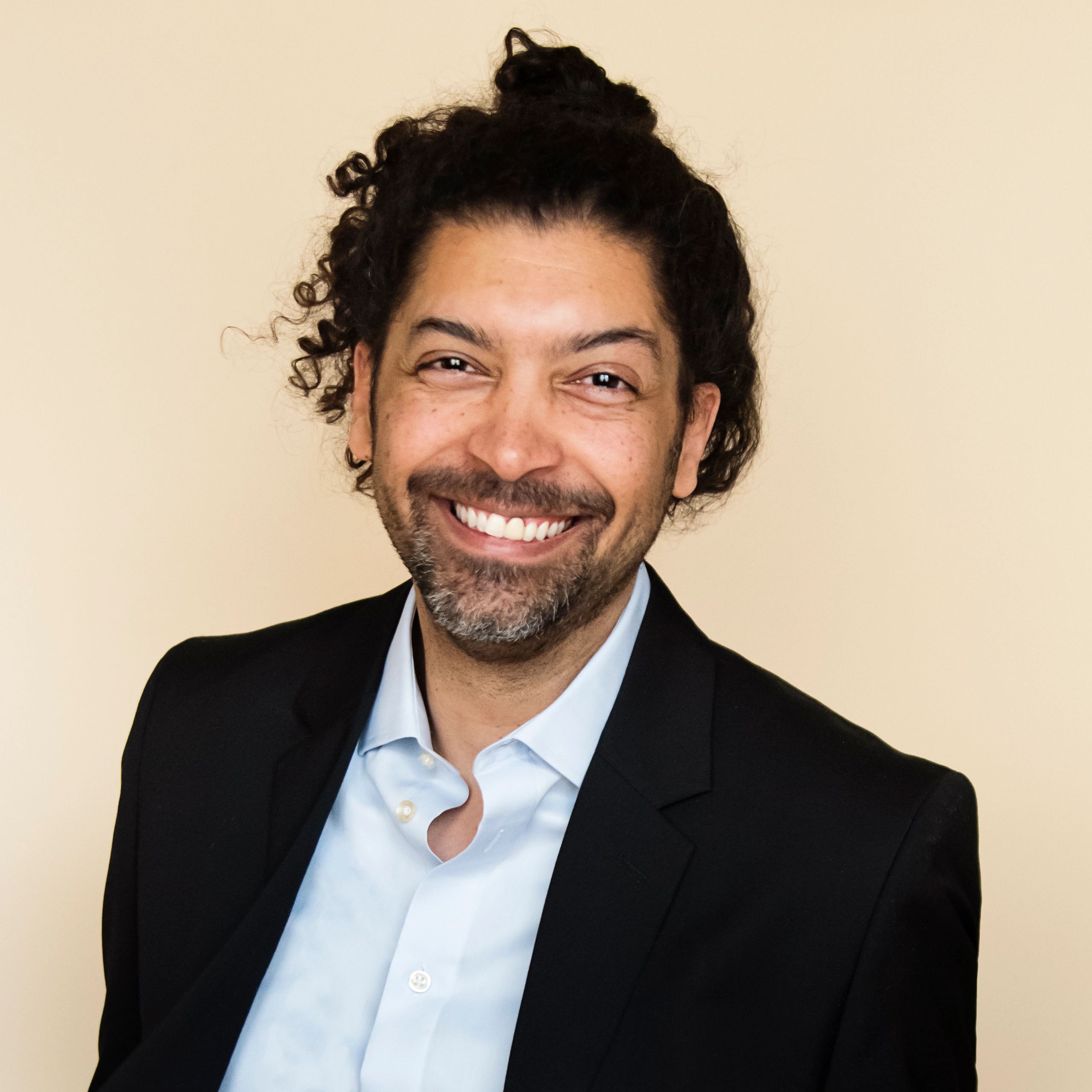 Professional headshot representing technical support