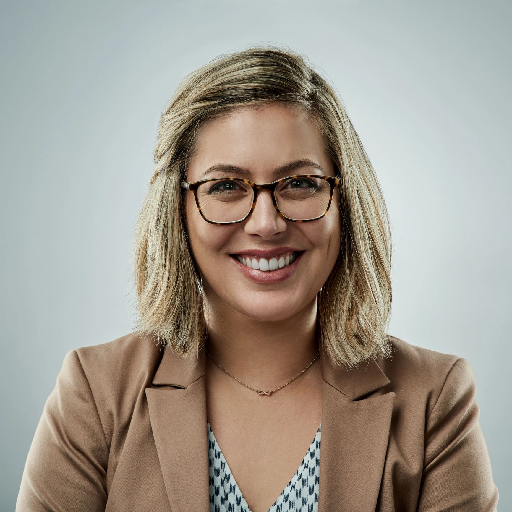 Professional headshot representing sales and account support
